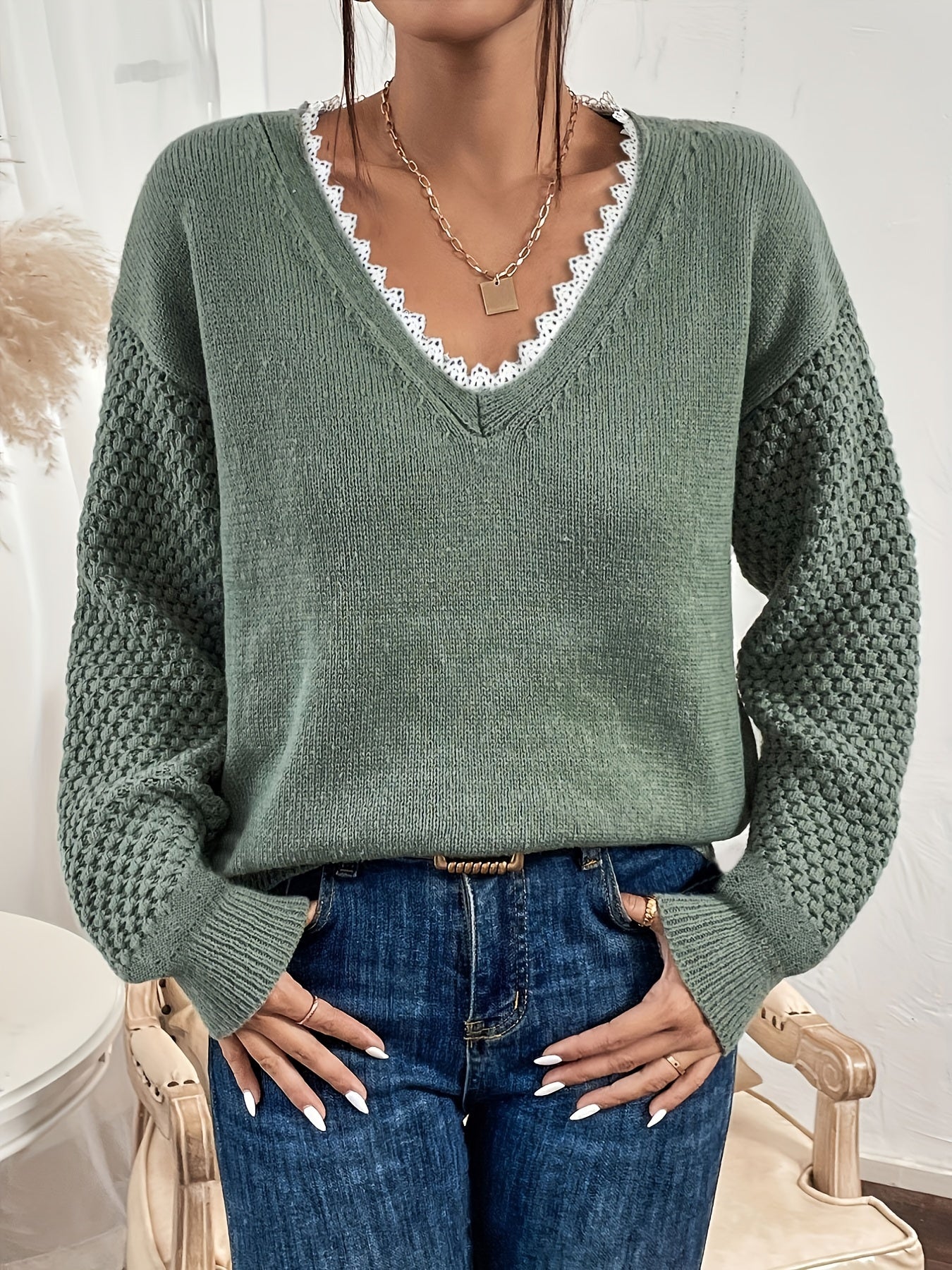 Pull en dentelle à col V