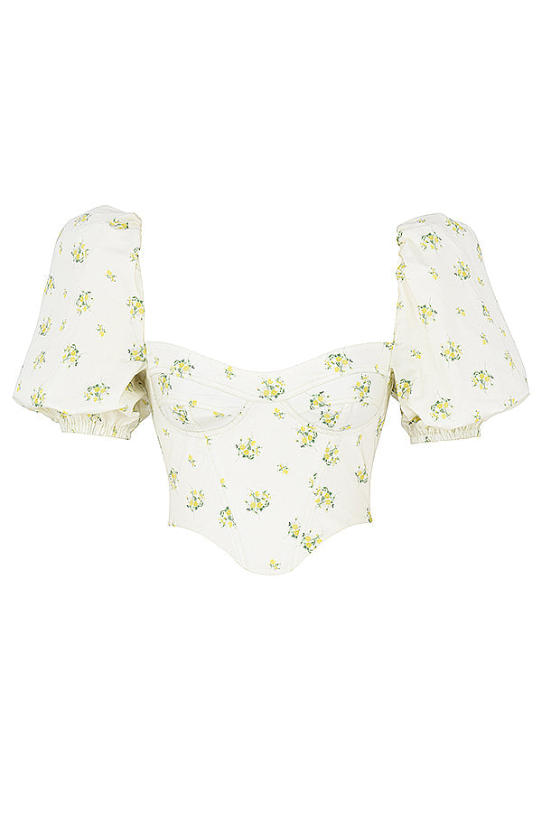Corset de couleur ivoire avec fleurs et manches bouffantes
