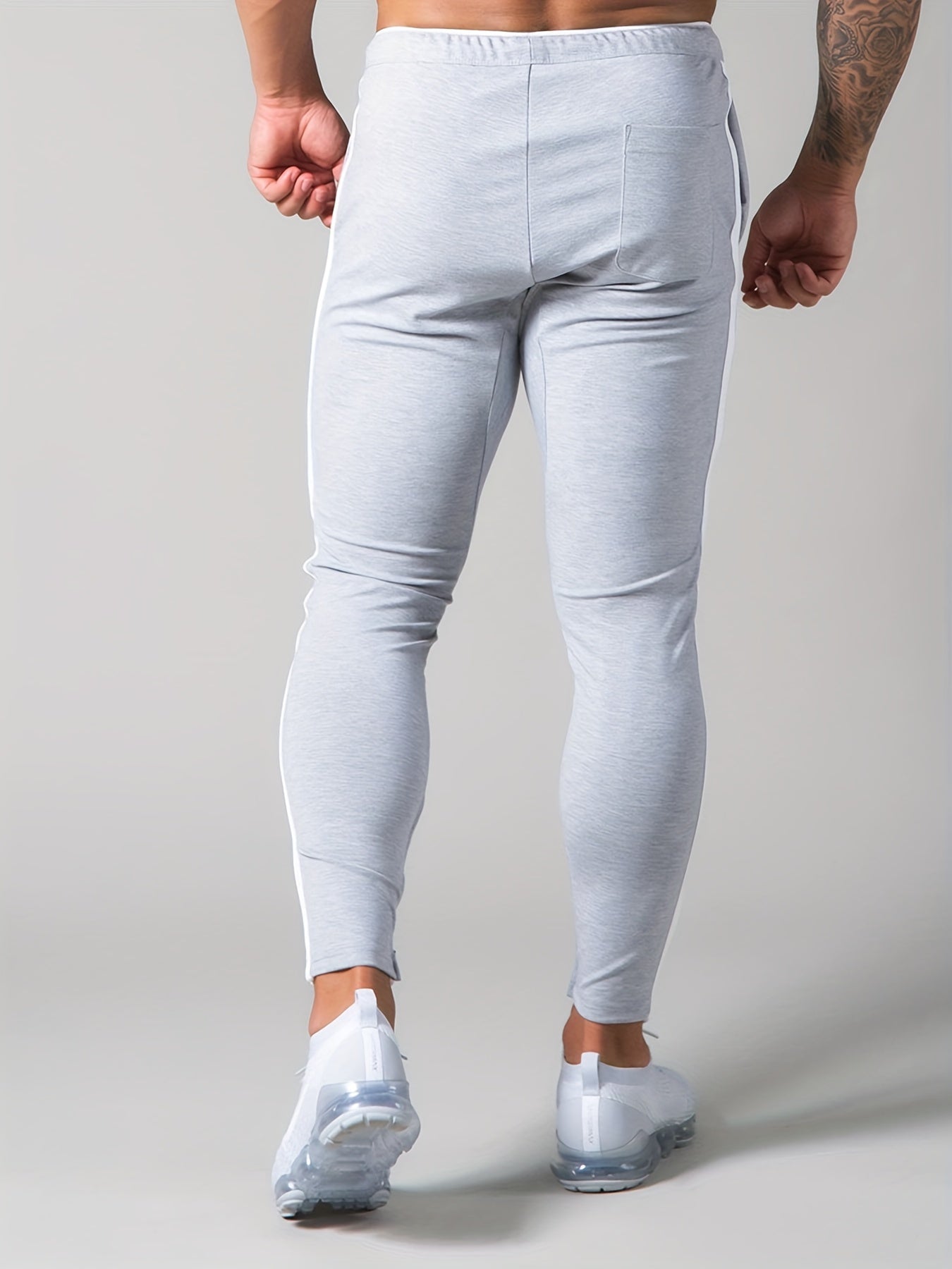 Pantalon de survàtement sportif à motif rayé