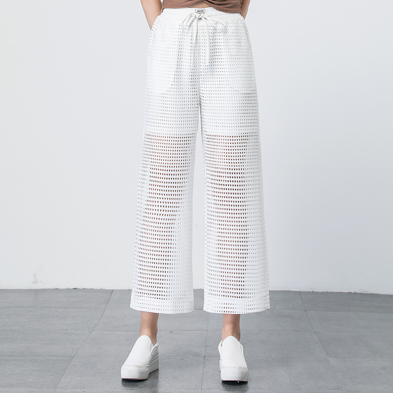 Pantalon large blanc transparent pour l'été