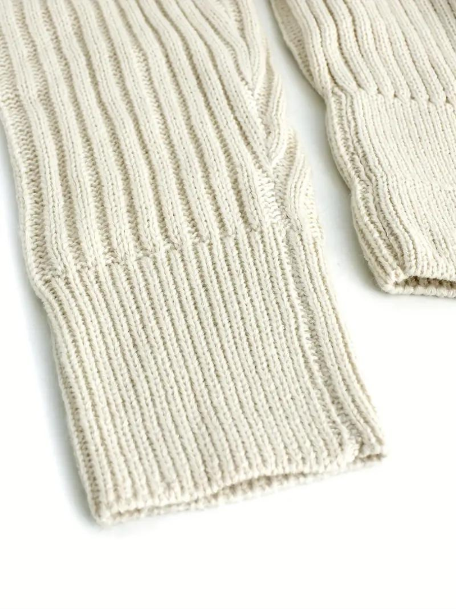 pull en maille côtelée à encolure asymétrique