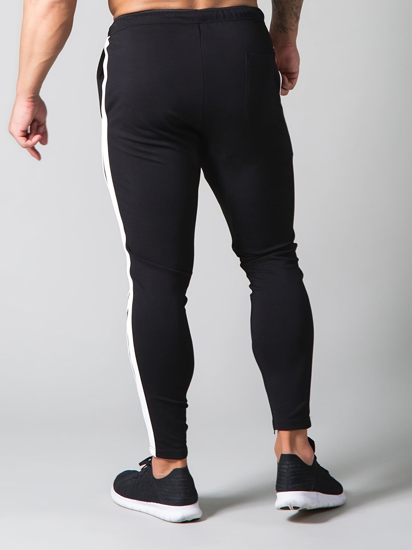Pantalon de survàtement sportif à motif rayé