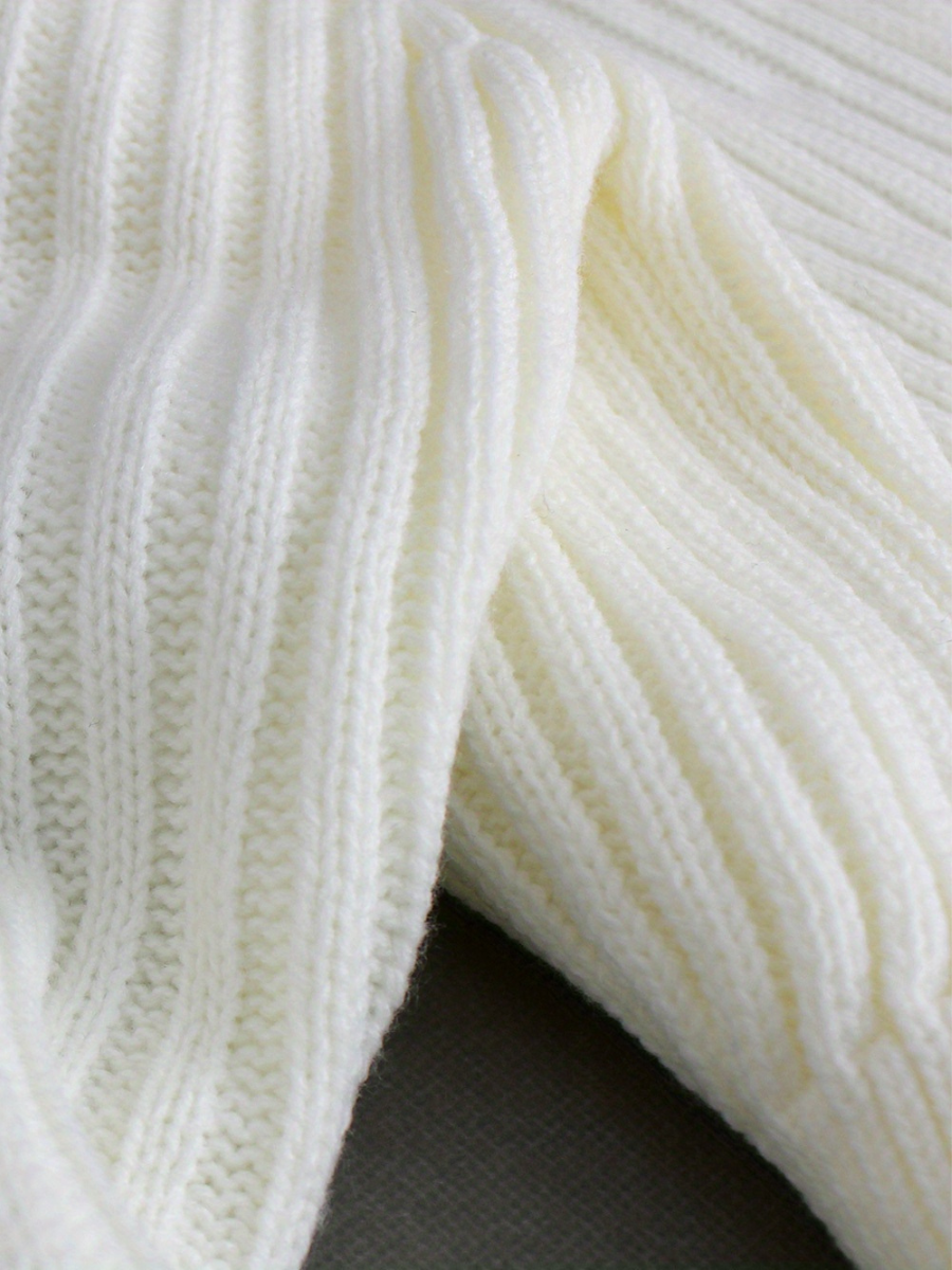 pull en maille côtelée à encolure asymétrique