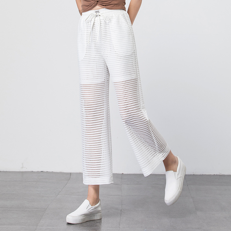 Pantalon large blanc transparent pour l'été
