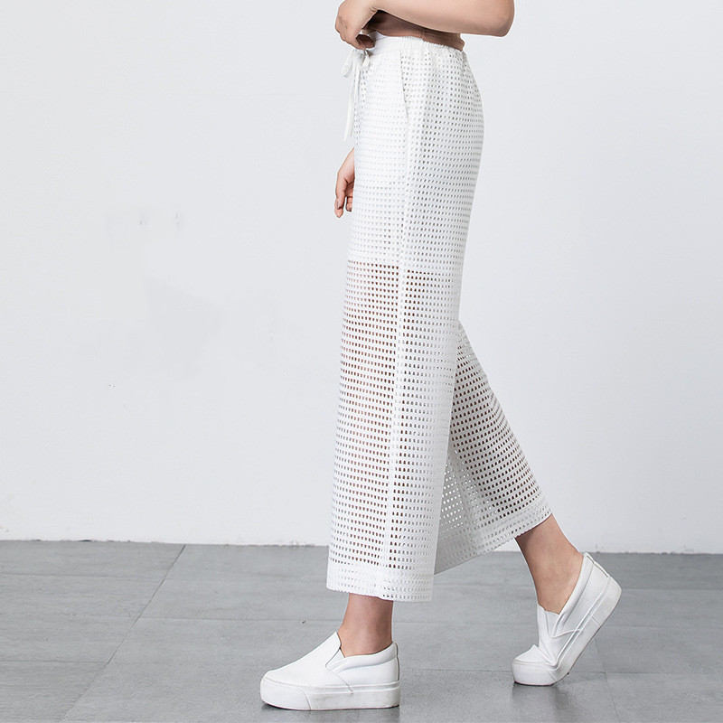 Pantalon large blanc transparent pour l'été