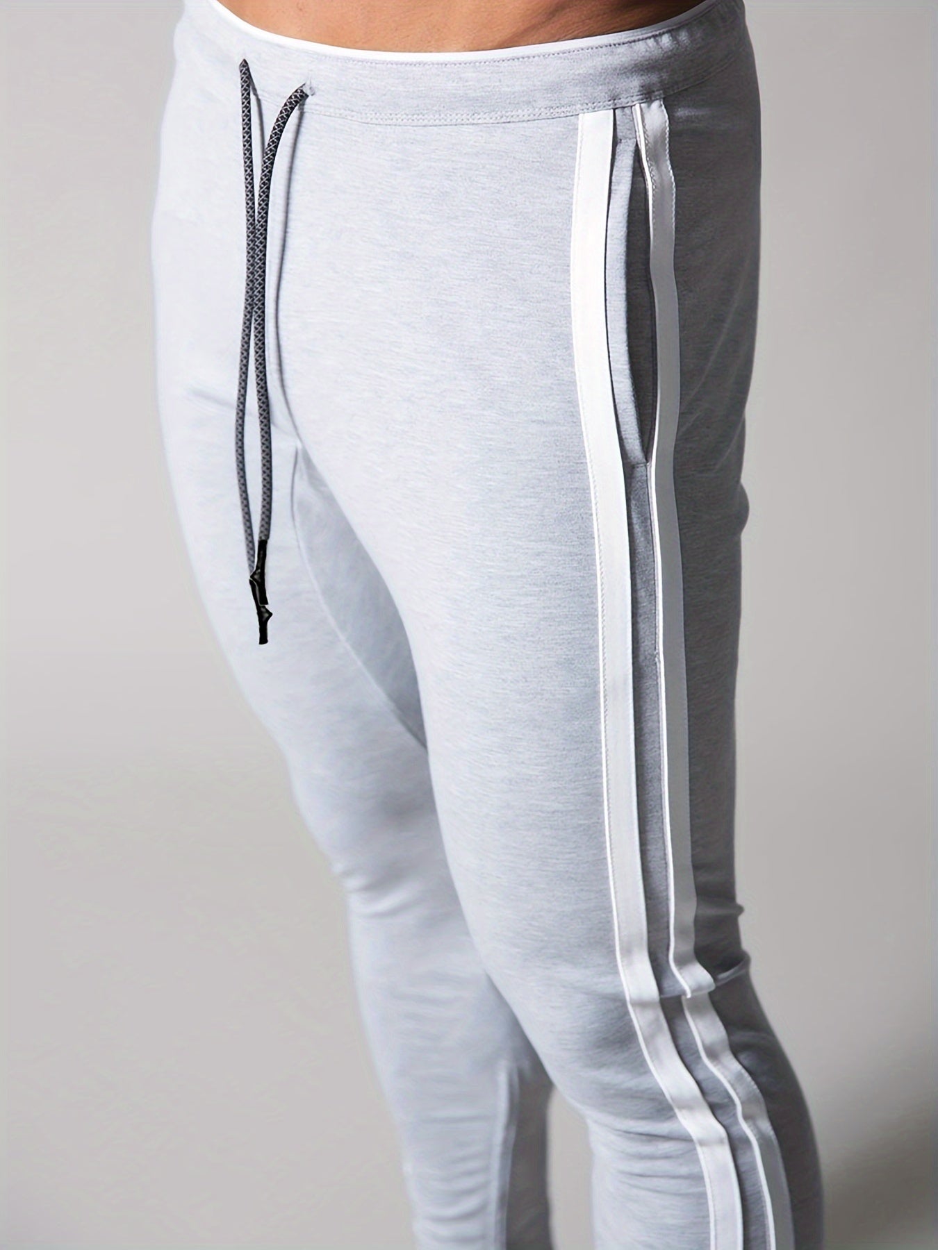 Pantalon de survàtement sportif à motif rayé