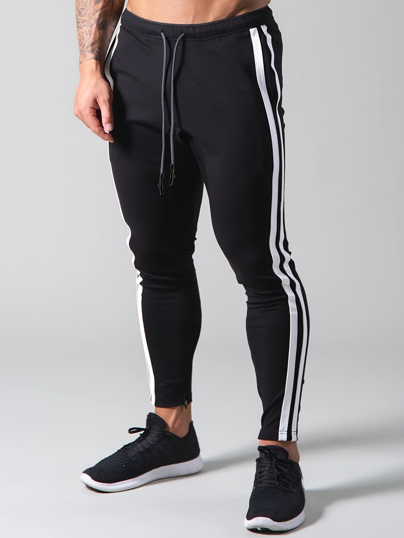 Pantalon de survàtement sportif à motif rayé