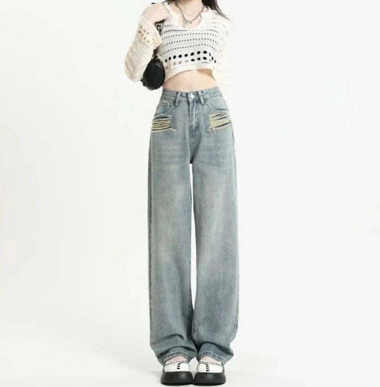 Jean taille haute avec poches déchirées