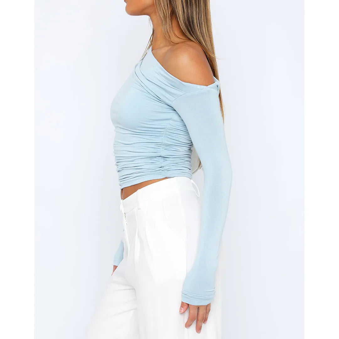 Top asymétrique torsadé