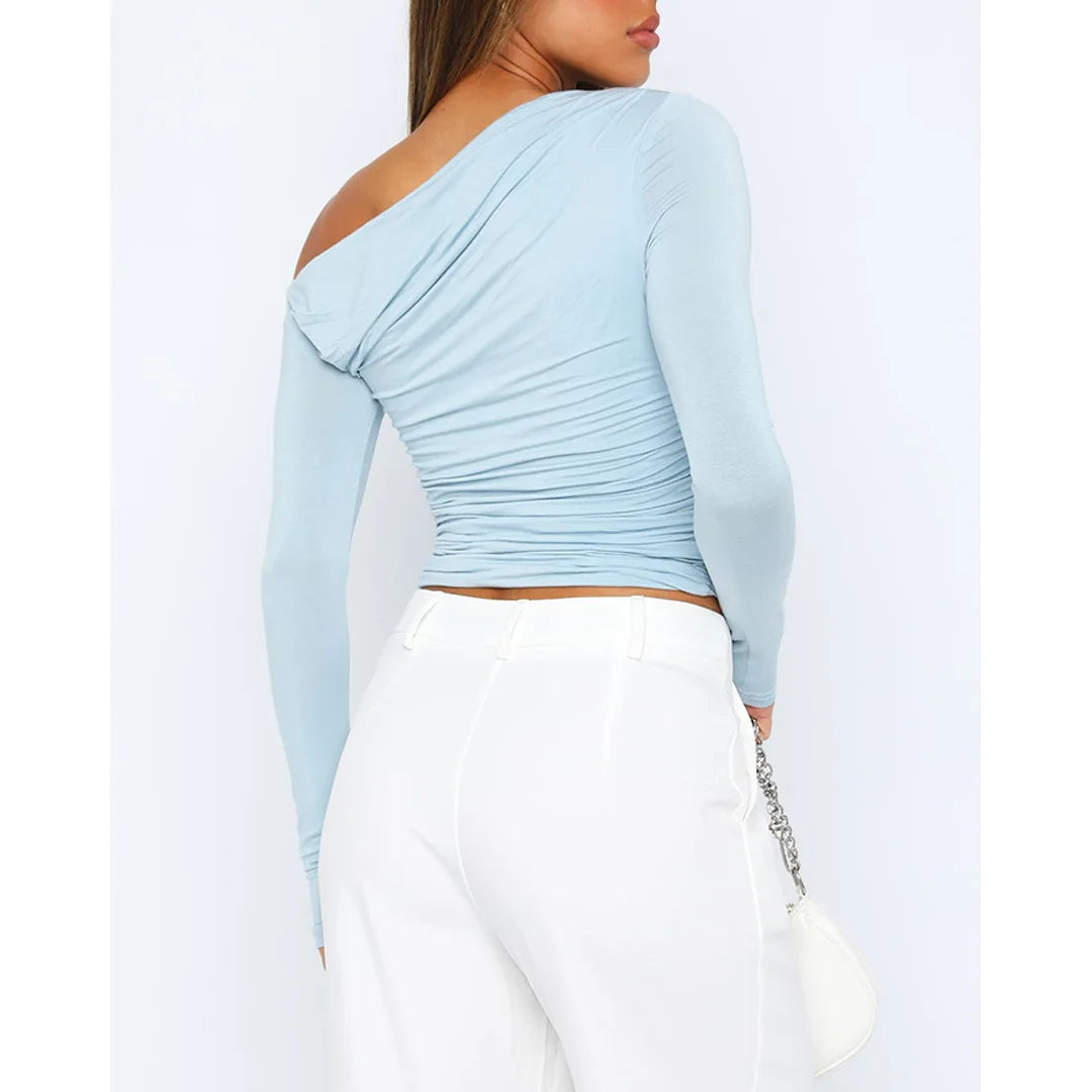 Top asymétrique torsadé