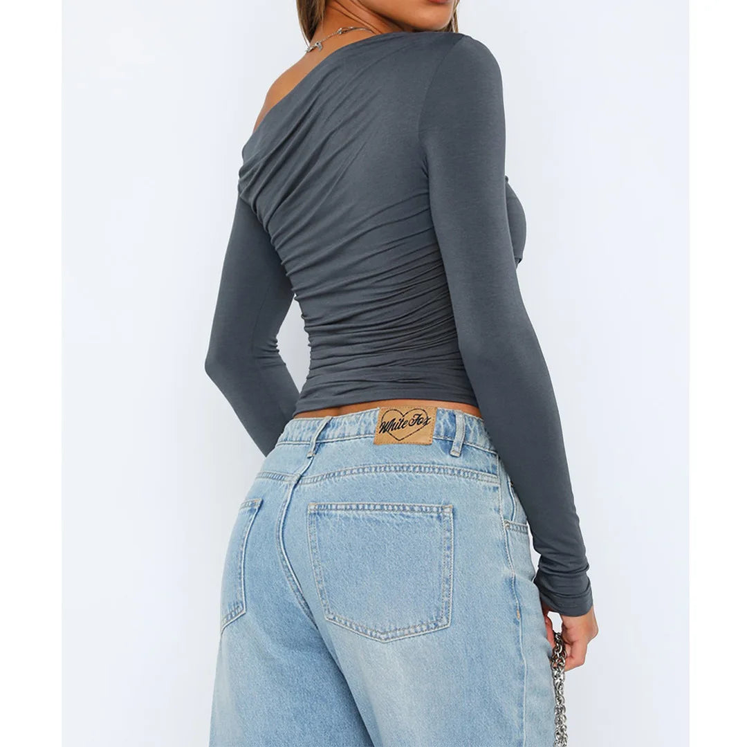 Top asymétrique torsadé
