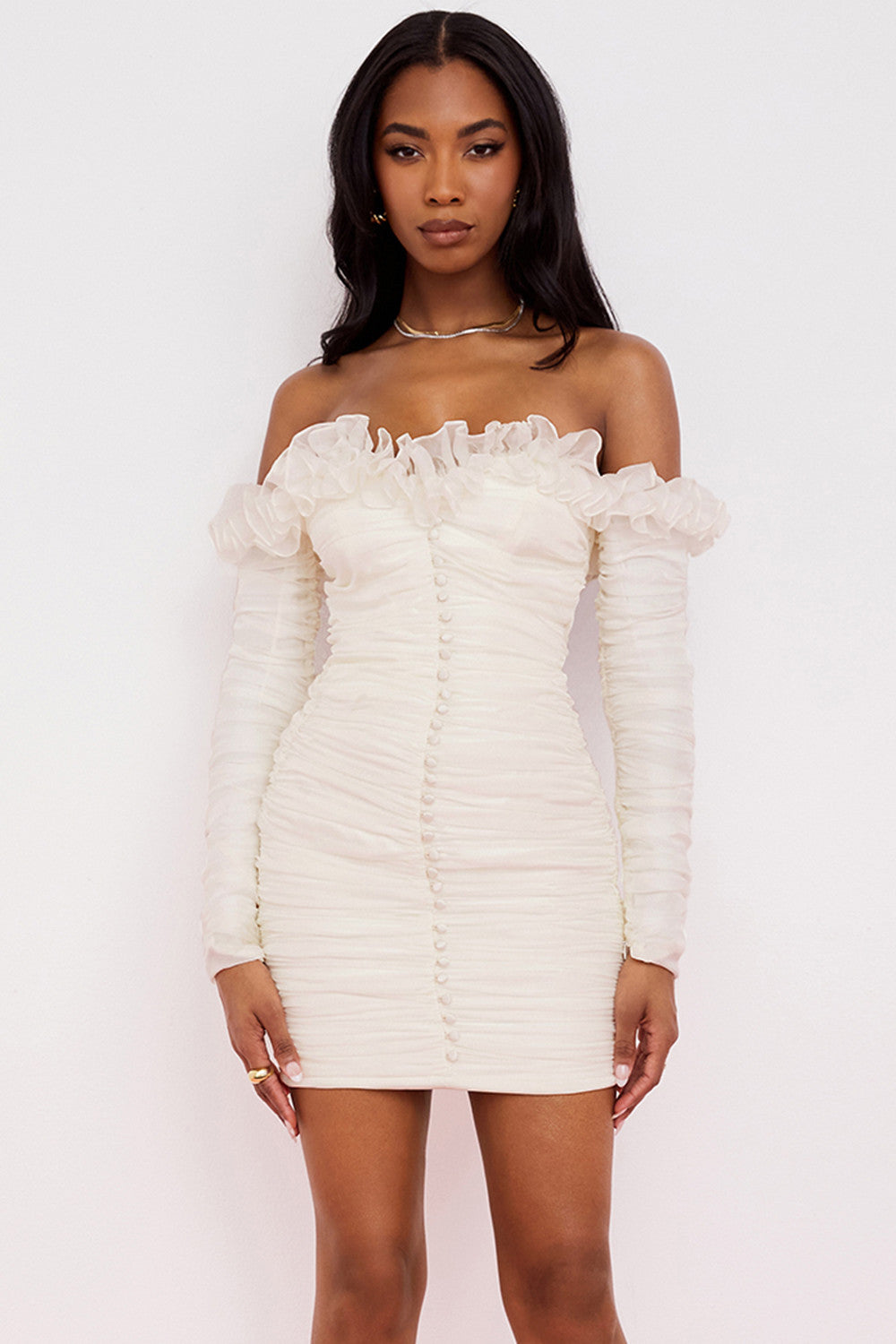 Robe bustier en mousseline ivoire à volants