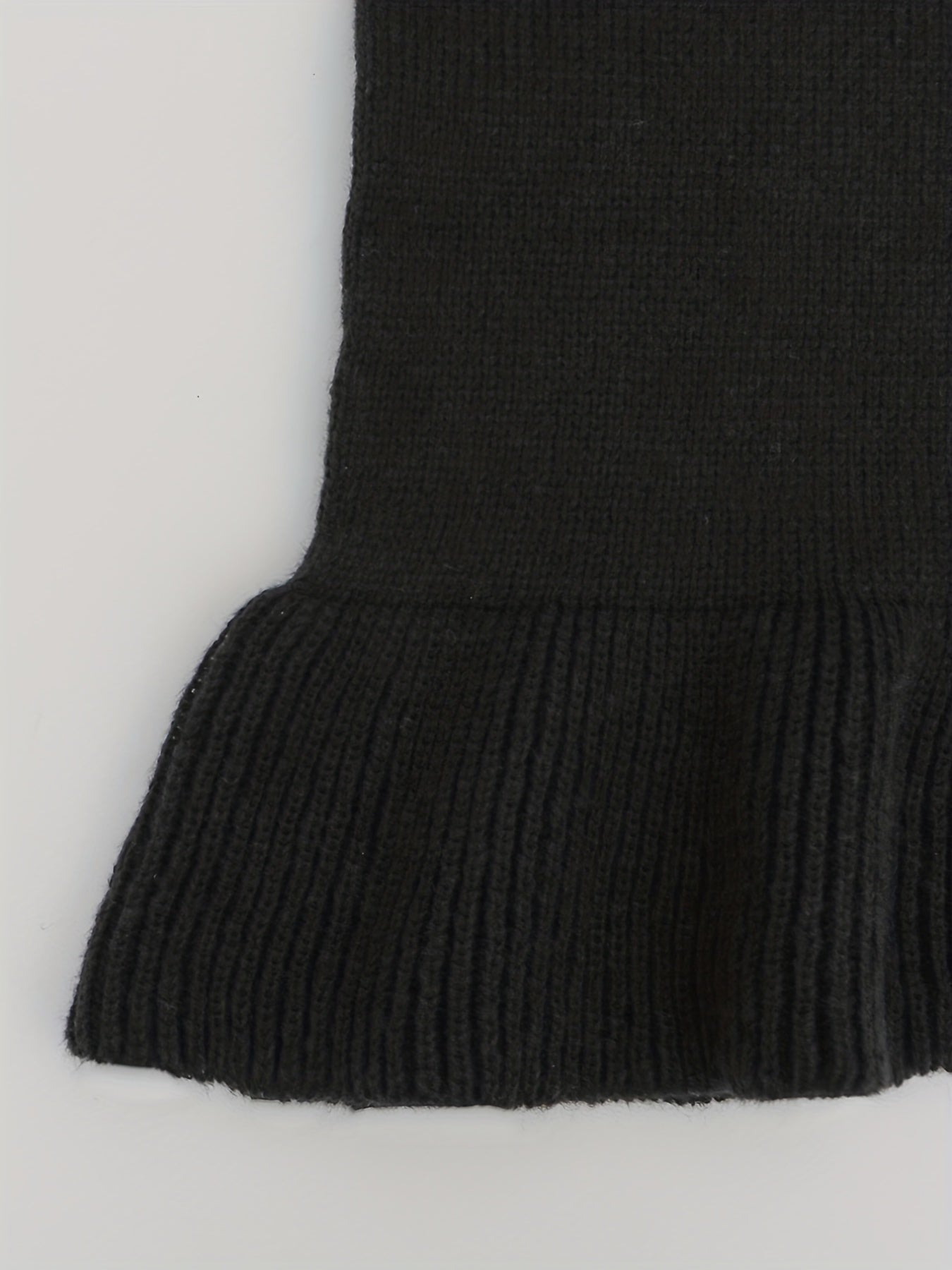 Robe en maille avec ourlet volanté