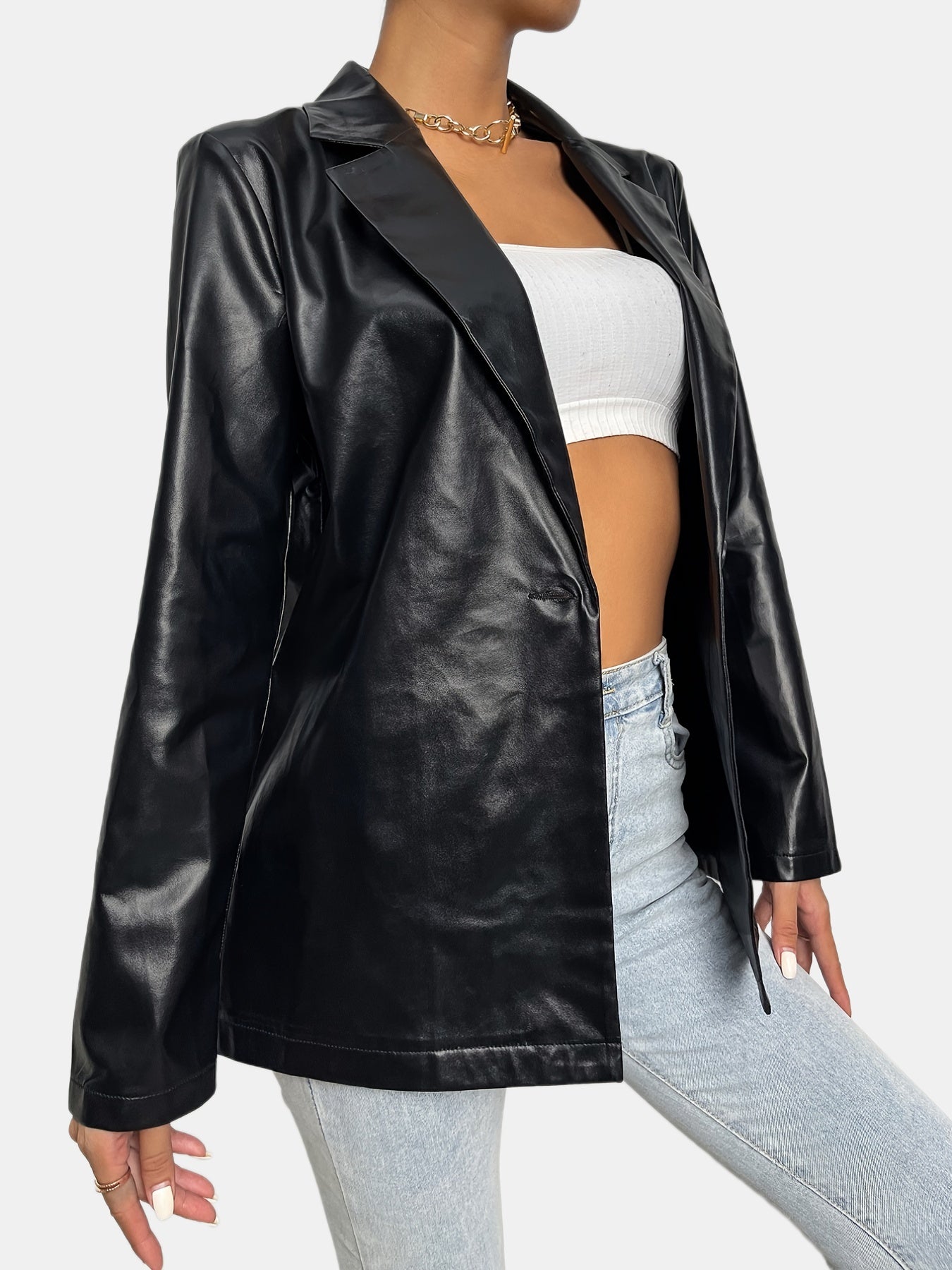 Veste noire en simili cuir avec revers