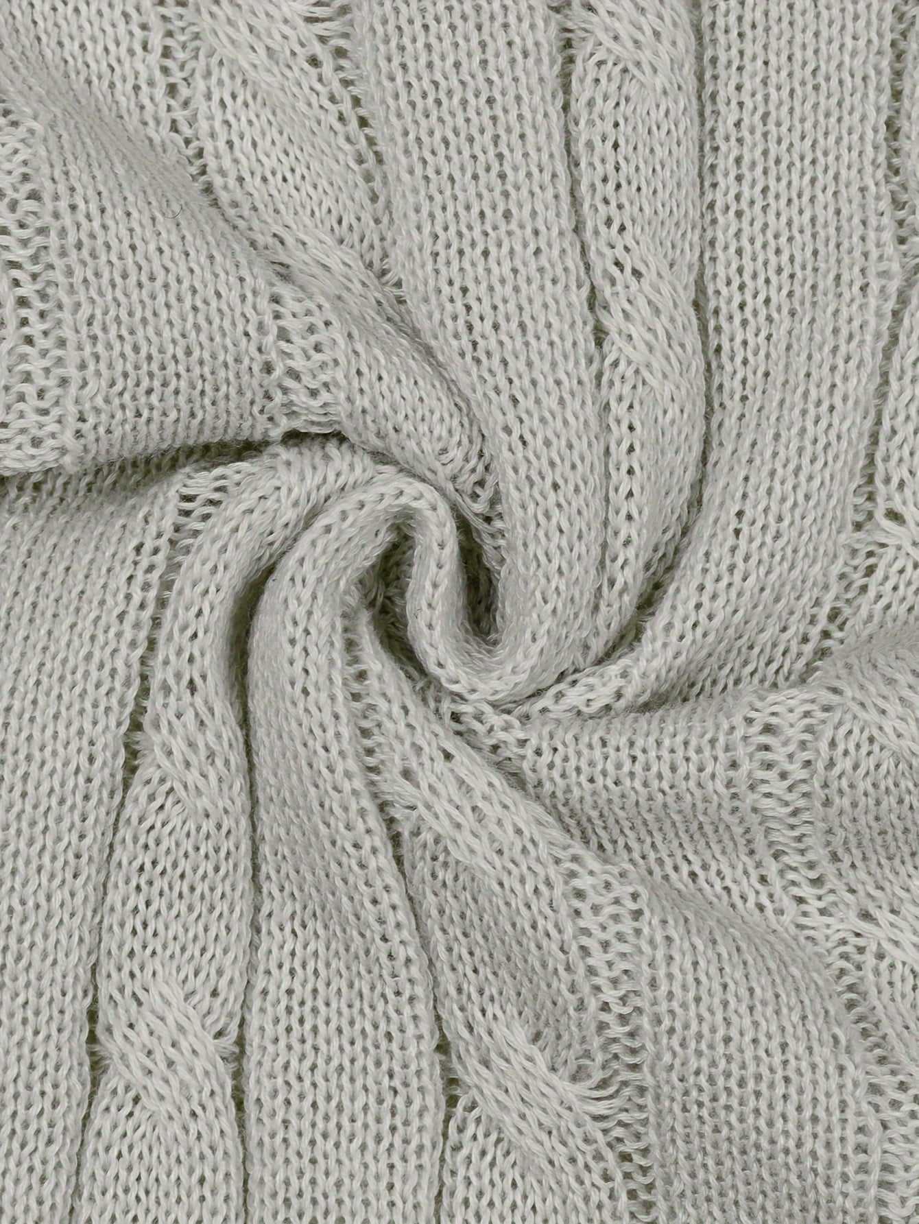 Pull court slim à motif torsadé