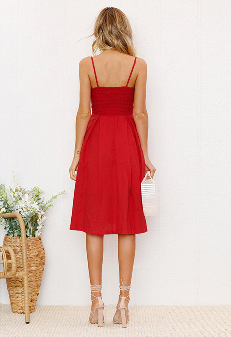 Robe mi-longue rouge avec boutons