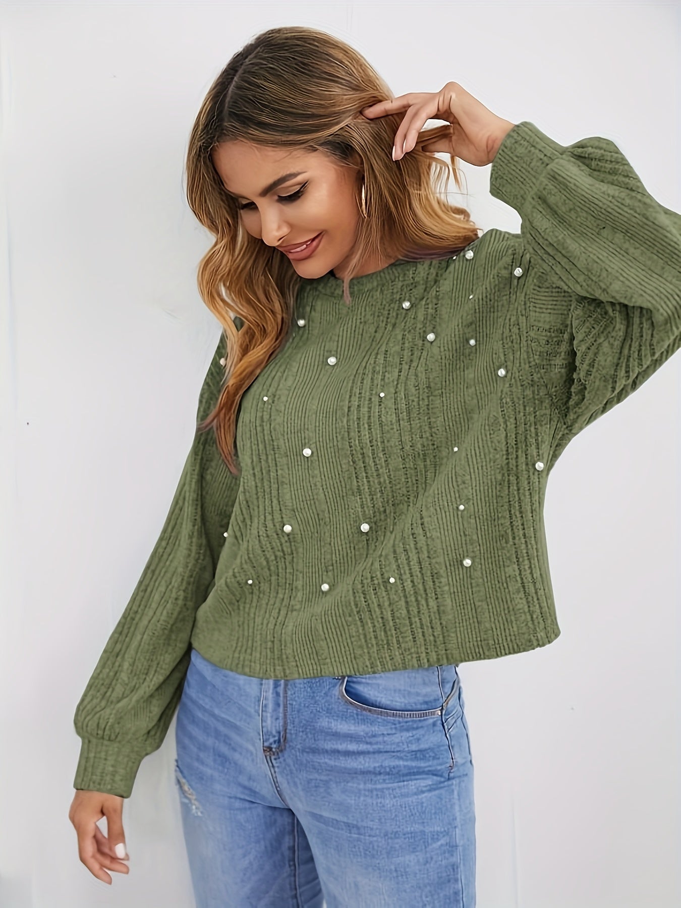 Pull côtelé à col rond et décoration de perles