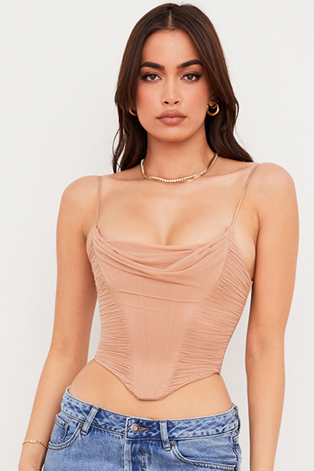 Corset drapé en résille beige