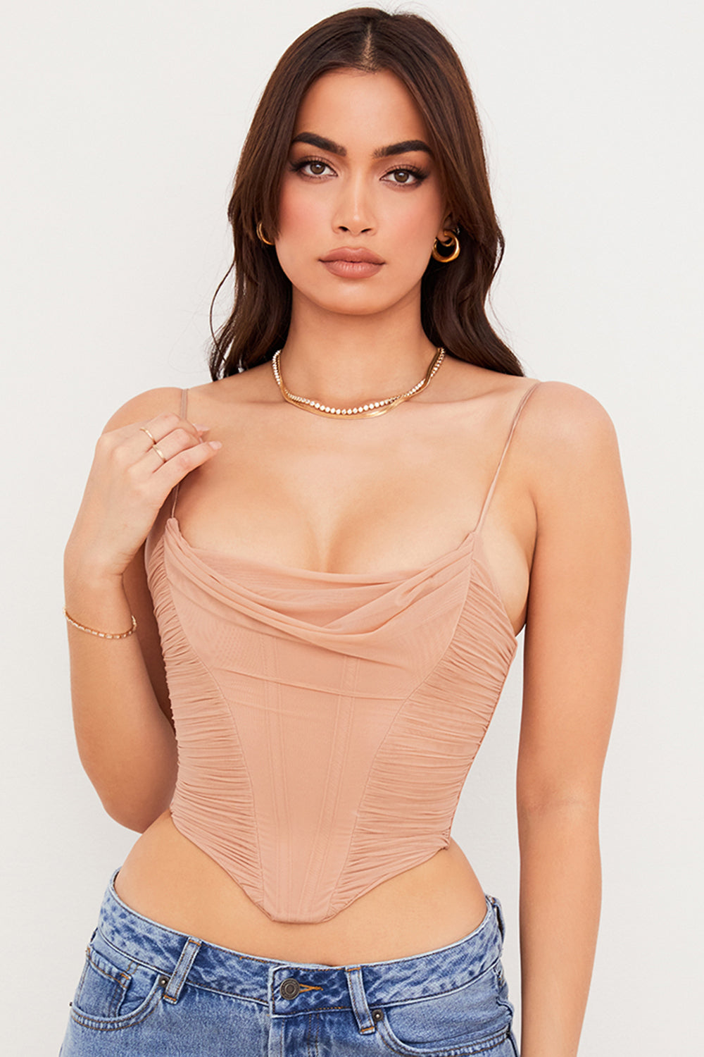 Corset drapé en résille beige