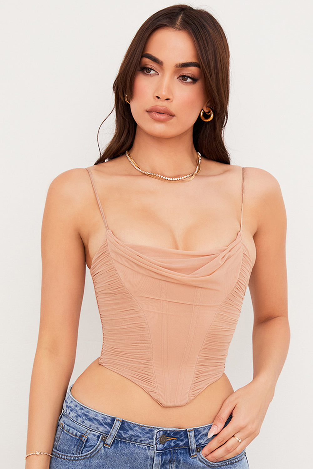Corset drapé en résille beige