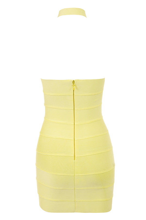 Mini-robe dos nu avec bandage et boutons d'or