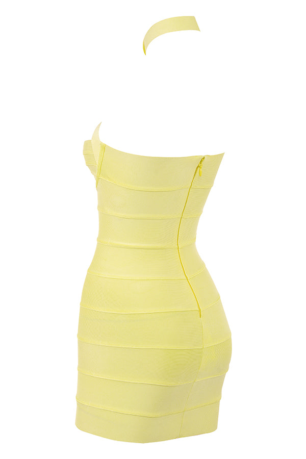 Mini-robe dos nu avec bandage et boutons d'or