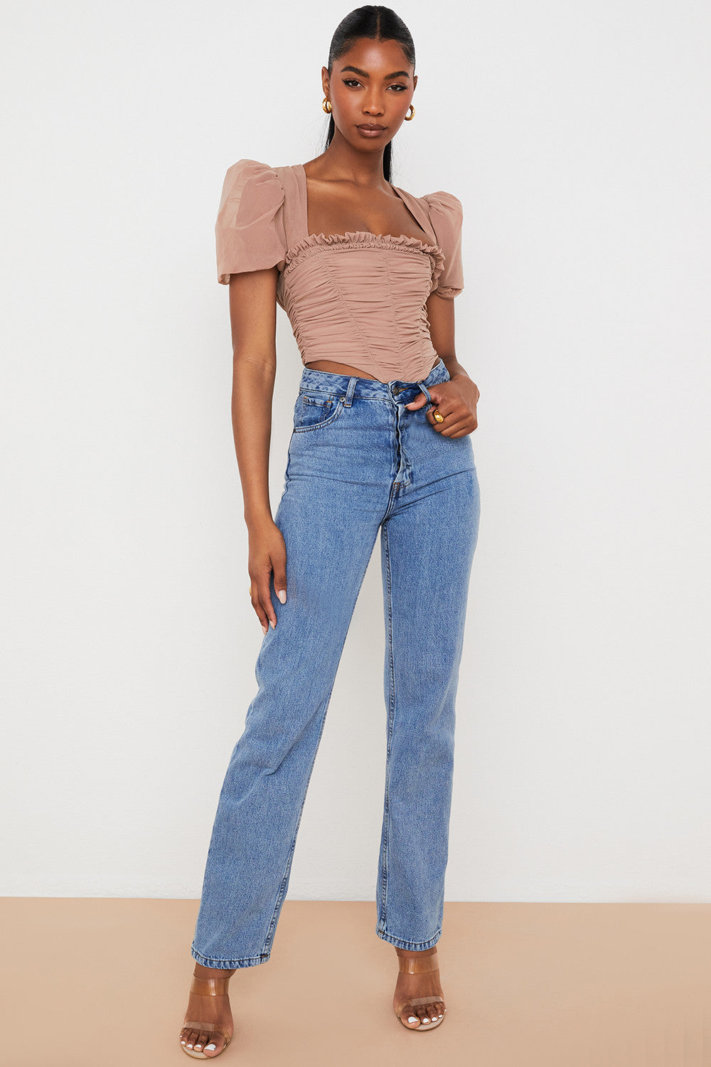 Corset en maille marron avec manches bouffantes et plis