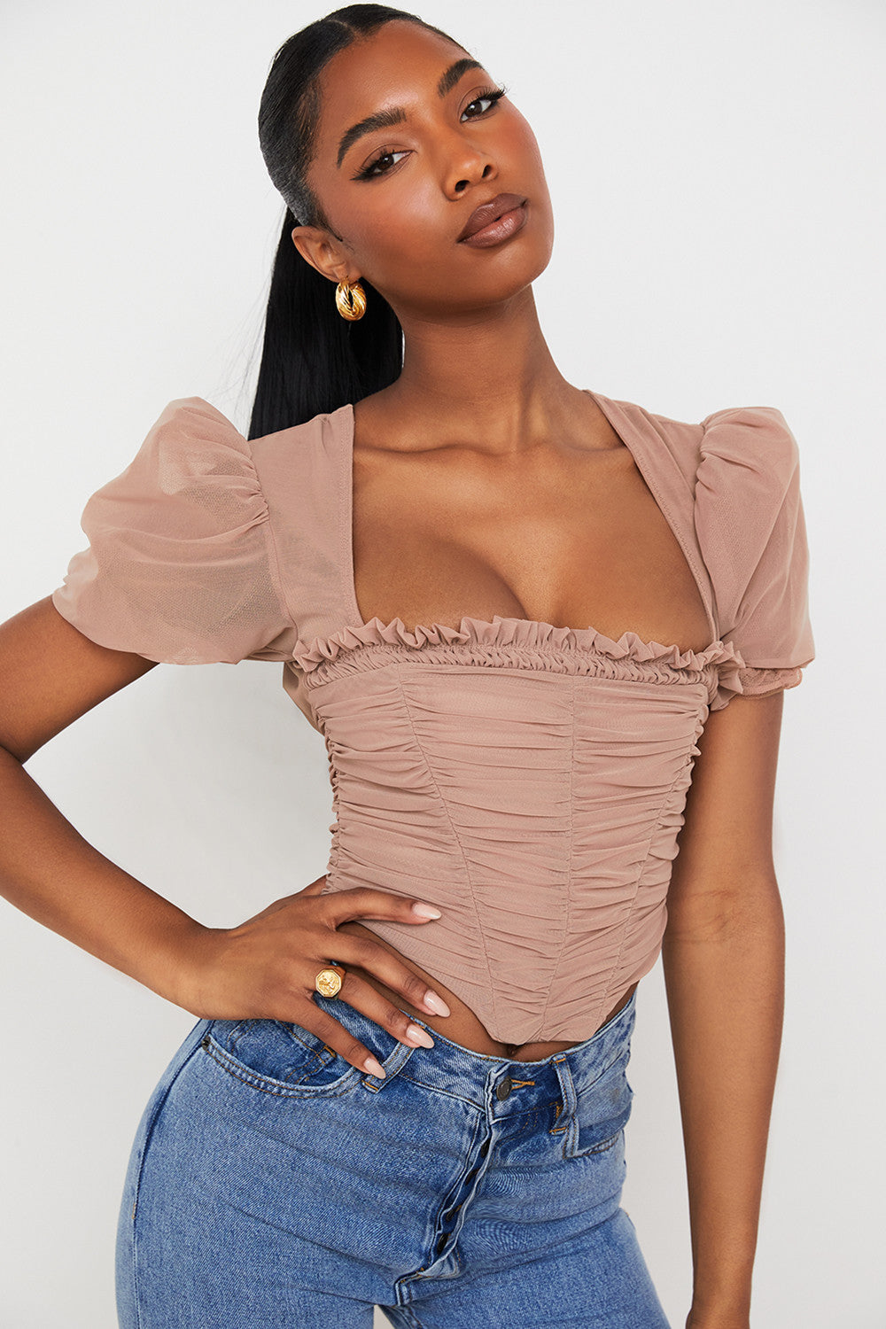 Corset en maille marron avec manches bouffantes et plis
