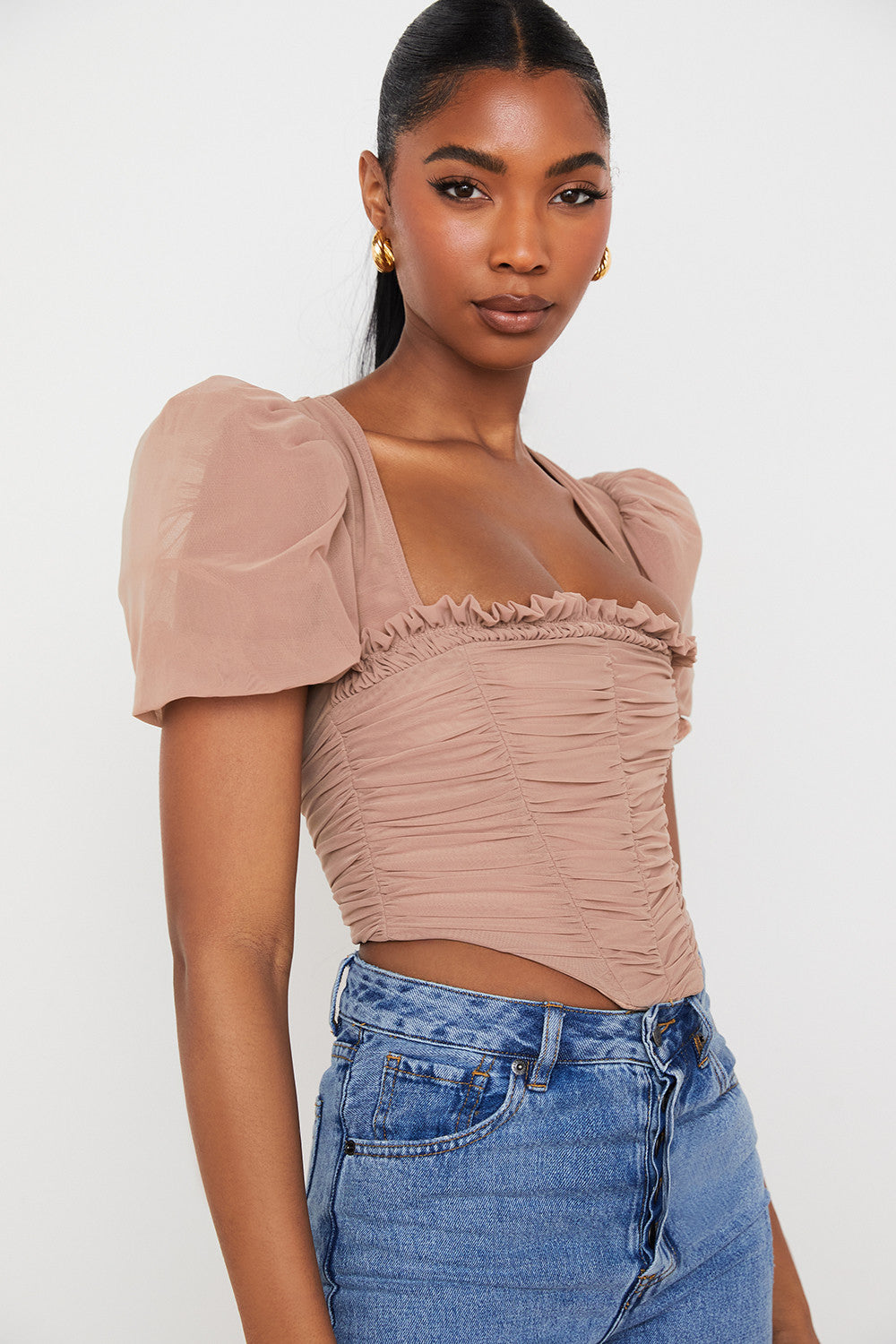 Corset en maille marron avec manches bouffantes et plis