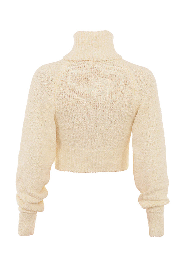 Pull court en maille bouclée douce de couleur cràme avec jupe midi
