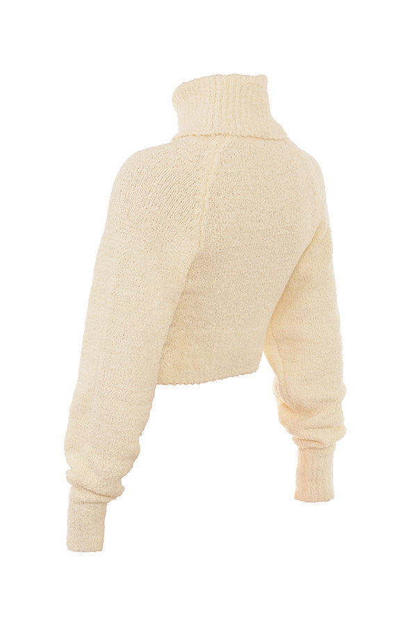 Pull court en maille bouclée douce de couleur cràme avec jupe midi