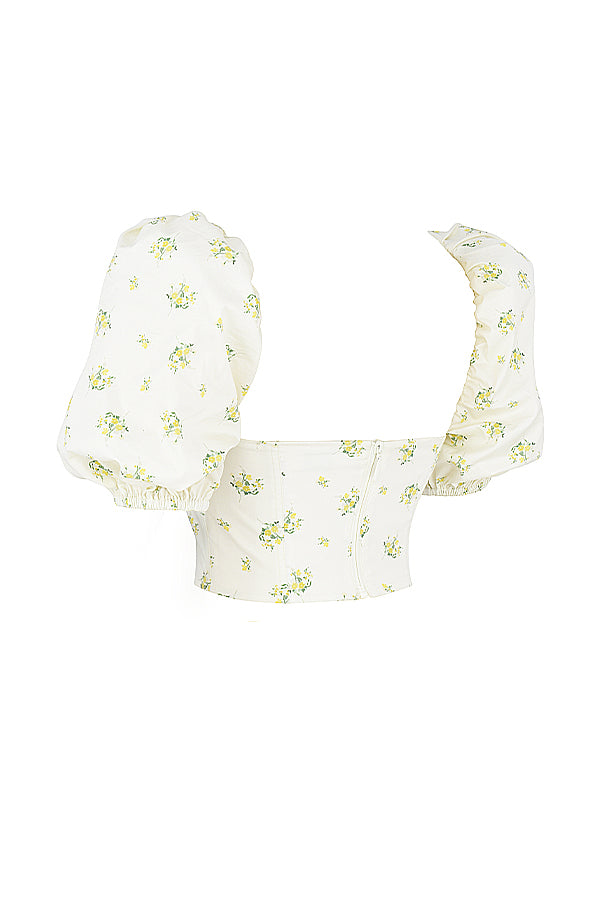 Corset de couleur ivoire avec fleurs et manches bouffantes