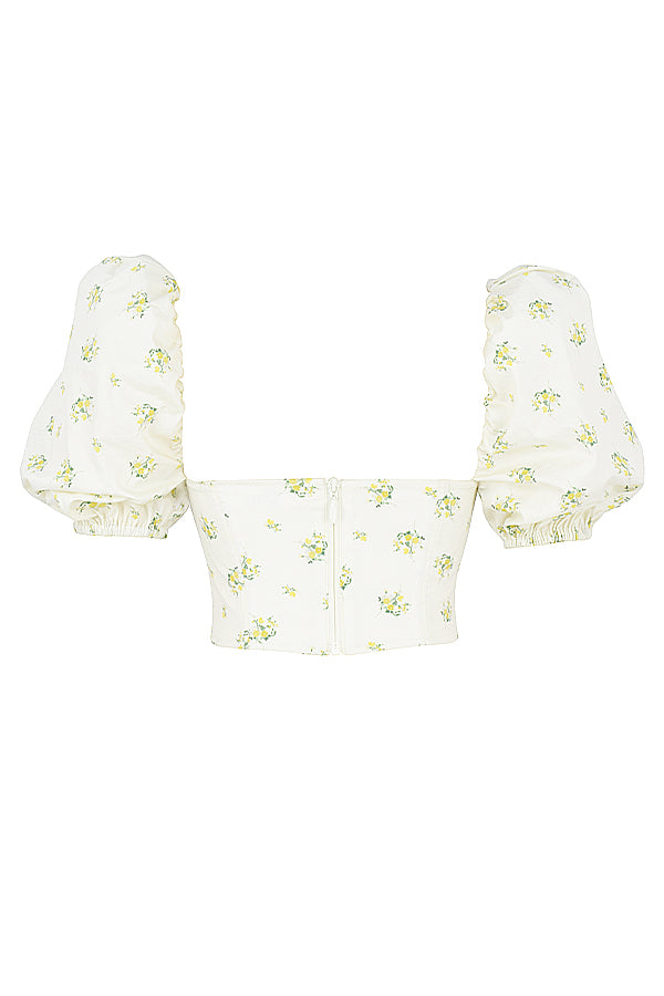 Corset de couleur ivoire avec fleurs et manches bouffantes