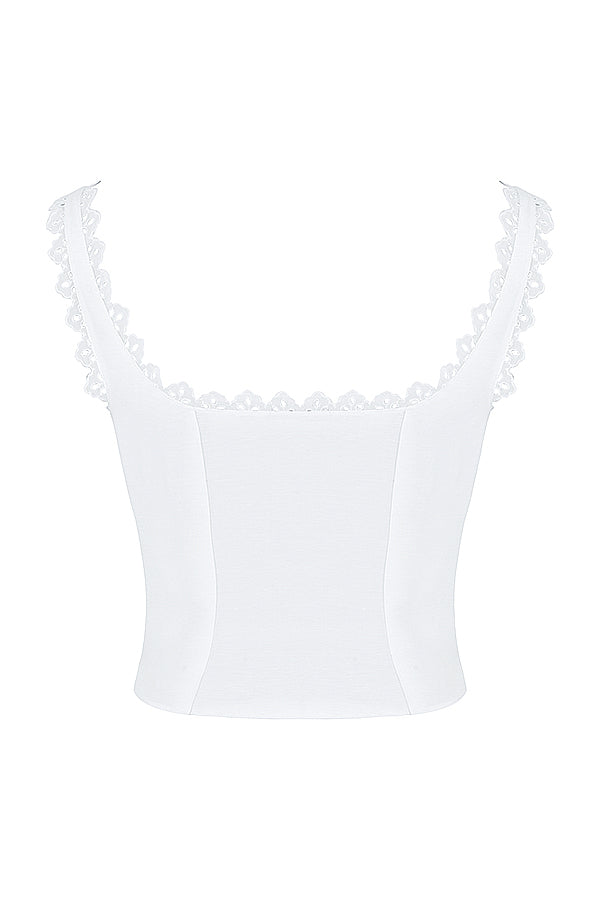 Haut en dentelle blanche avec mini-jupe trapàze en lin