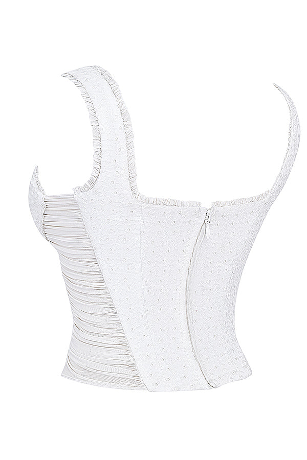 Corset en broderie anglaise blanche avec mini-jupe superposée