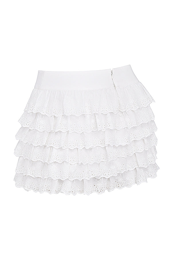 Corset en broderie anglaise blanche avec mini-jupe superposée