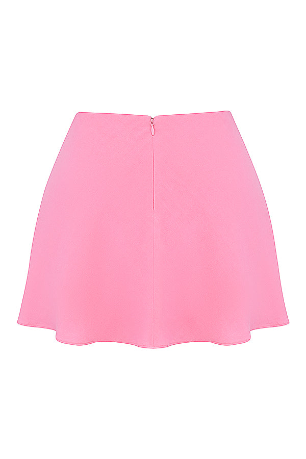 Haut rose français avec ourlet mouchoir et mini-jupe flottante
