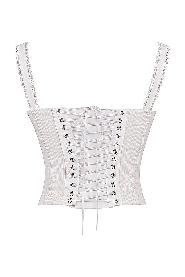 Corset en dentelle blanche au dos