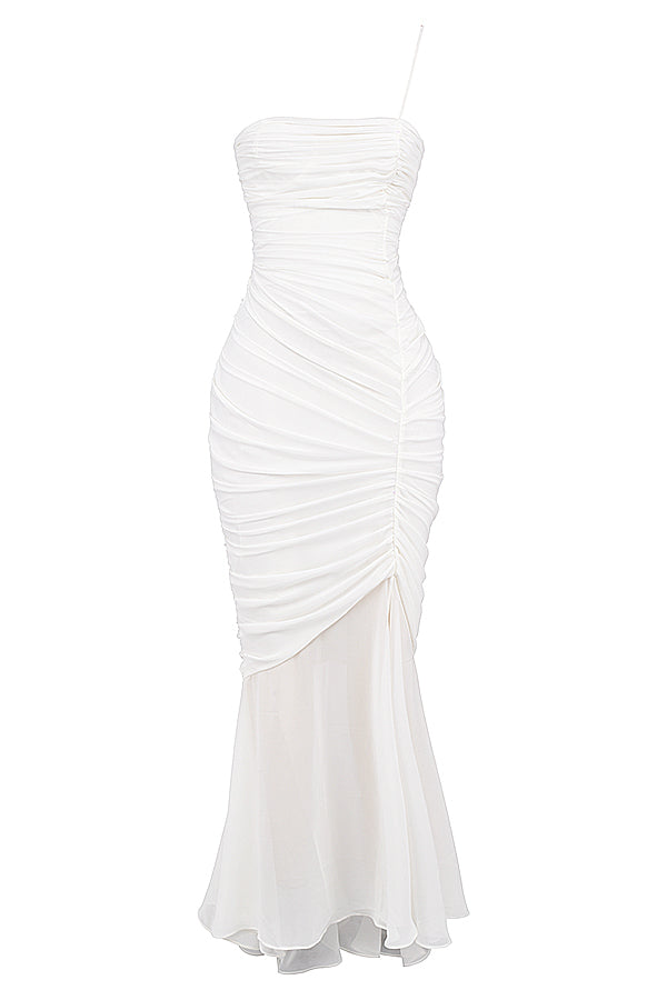Robe longue de couleur ivoire à volants