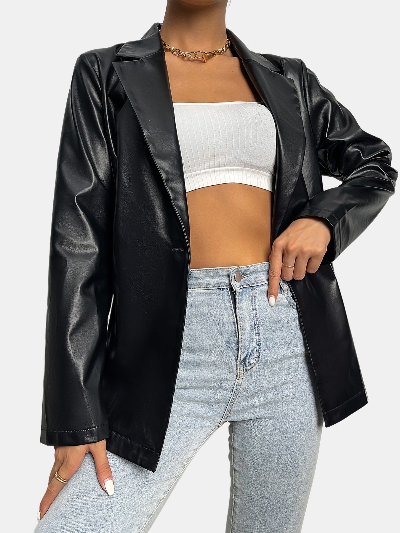Veste noire en simili cuir avec revers