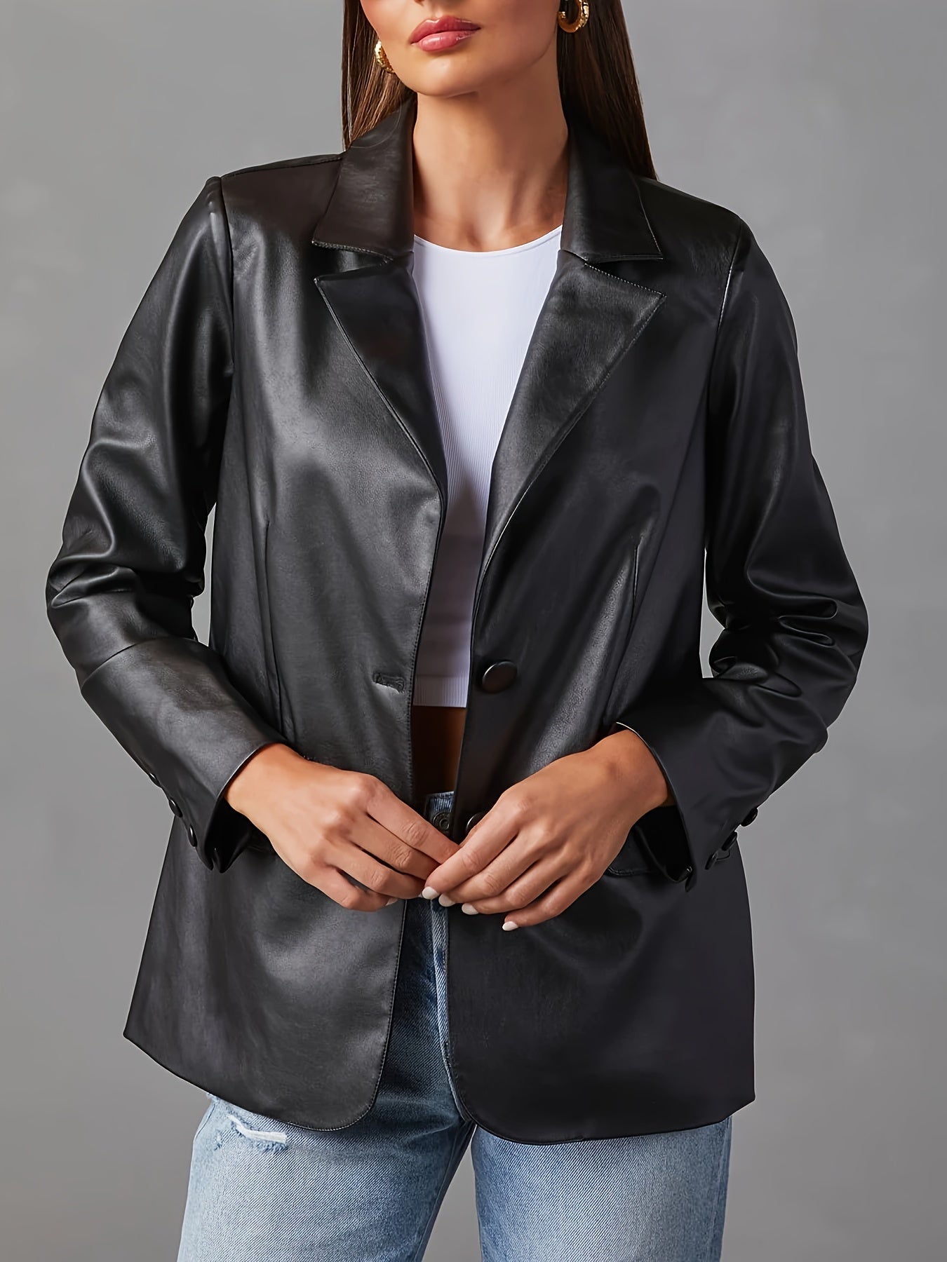 Veste en cuir noir avec bouton
