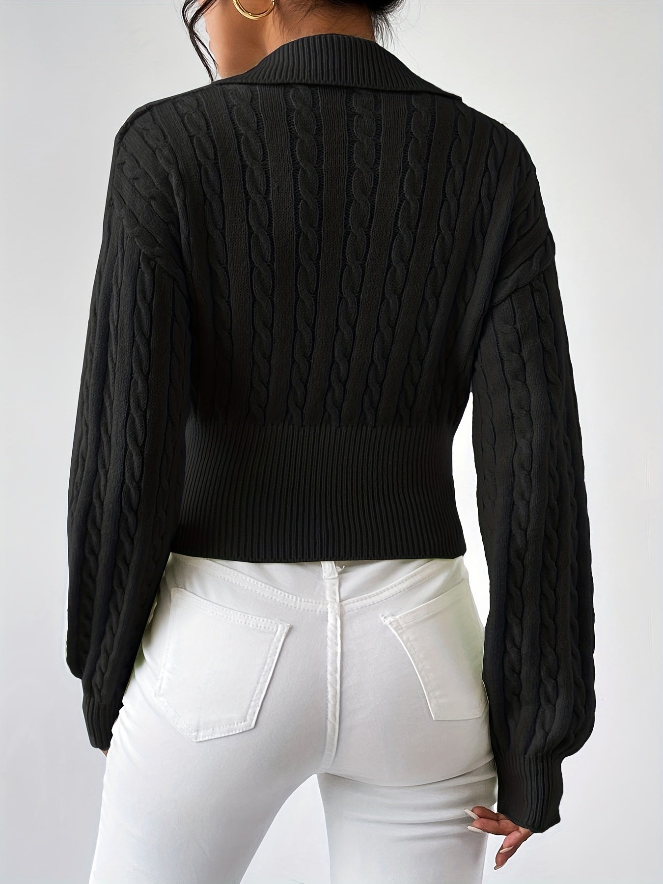 Pull en maille à col V structuré torsadé