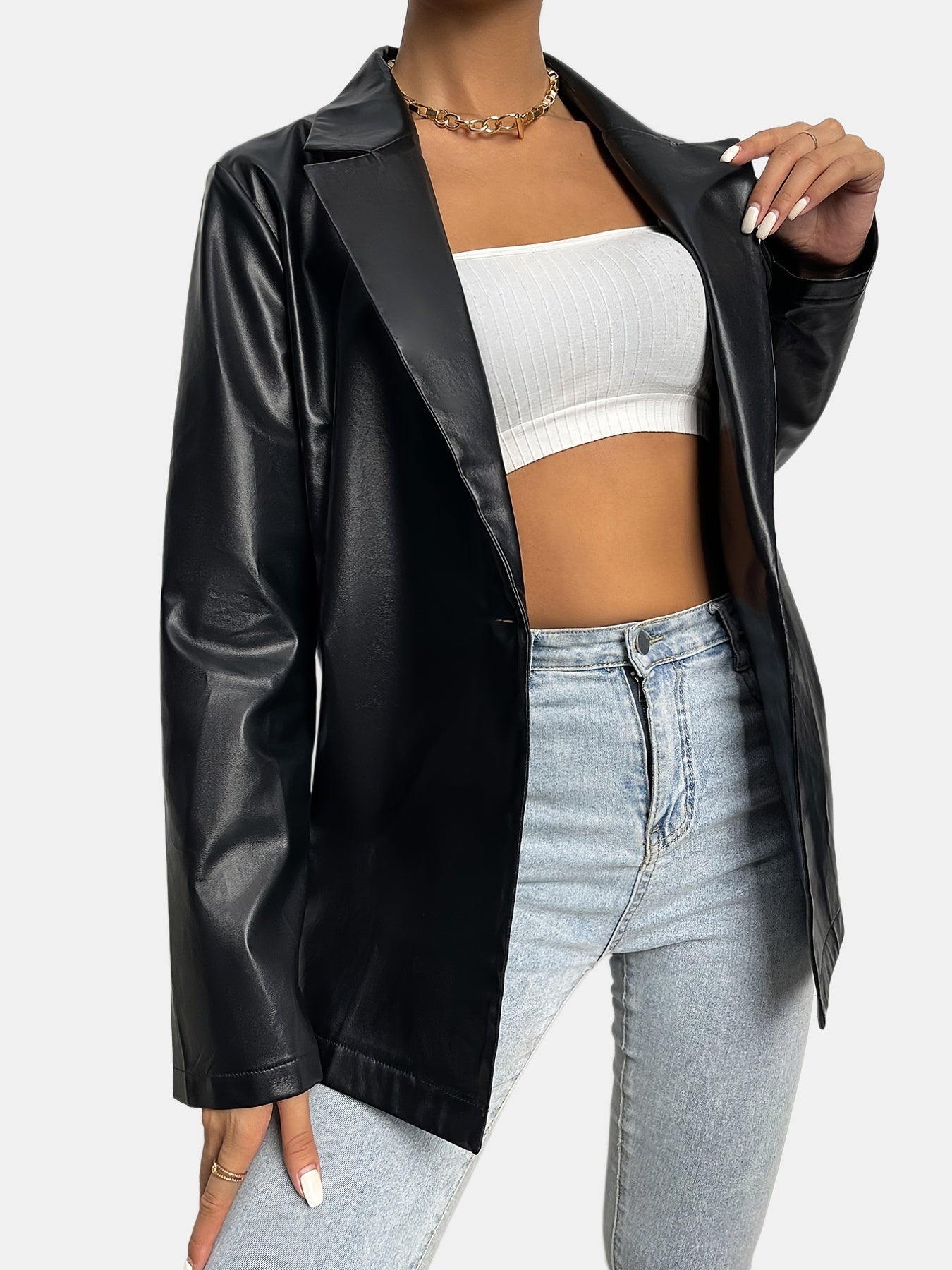 Veste noire en simili cuir avec revers
