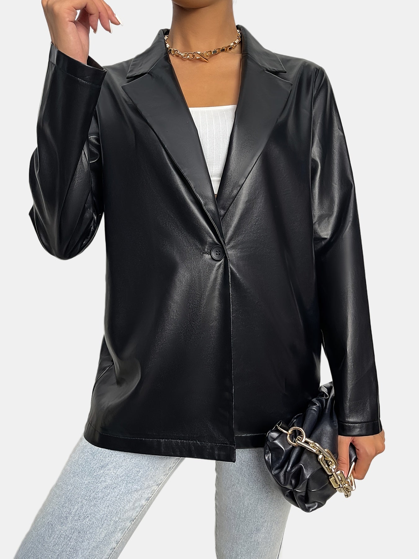 Veste noire en simili cuir avec revers