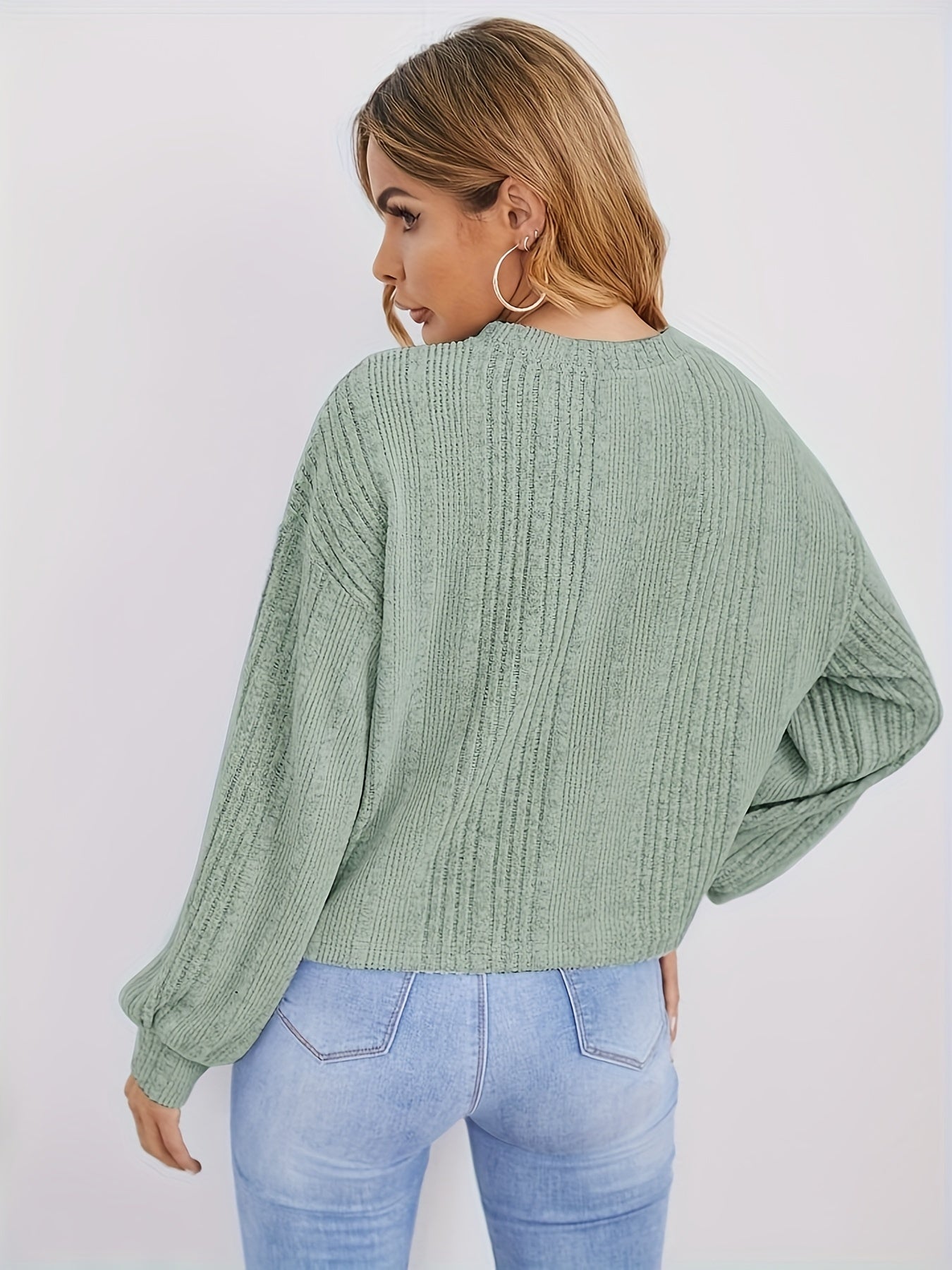 Pull côtelé à col rond et décoration de perles