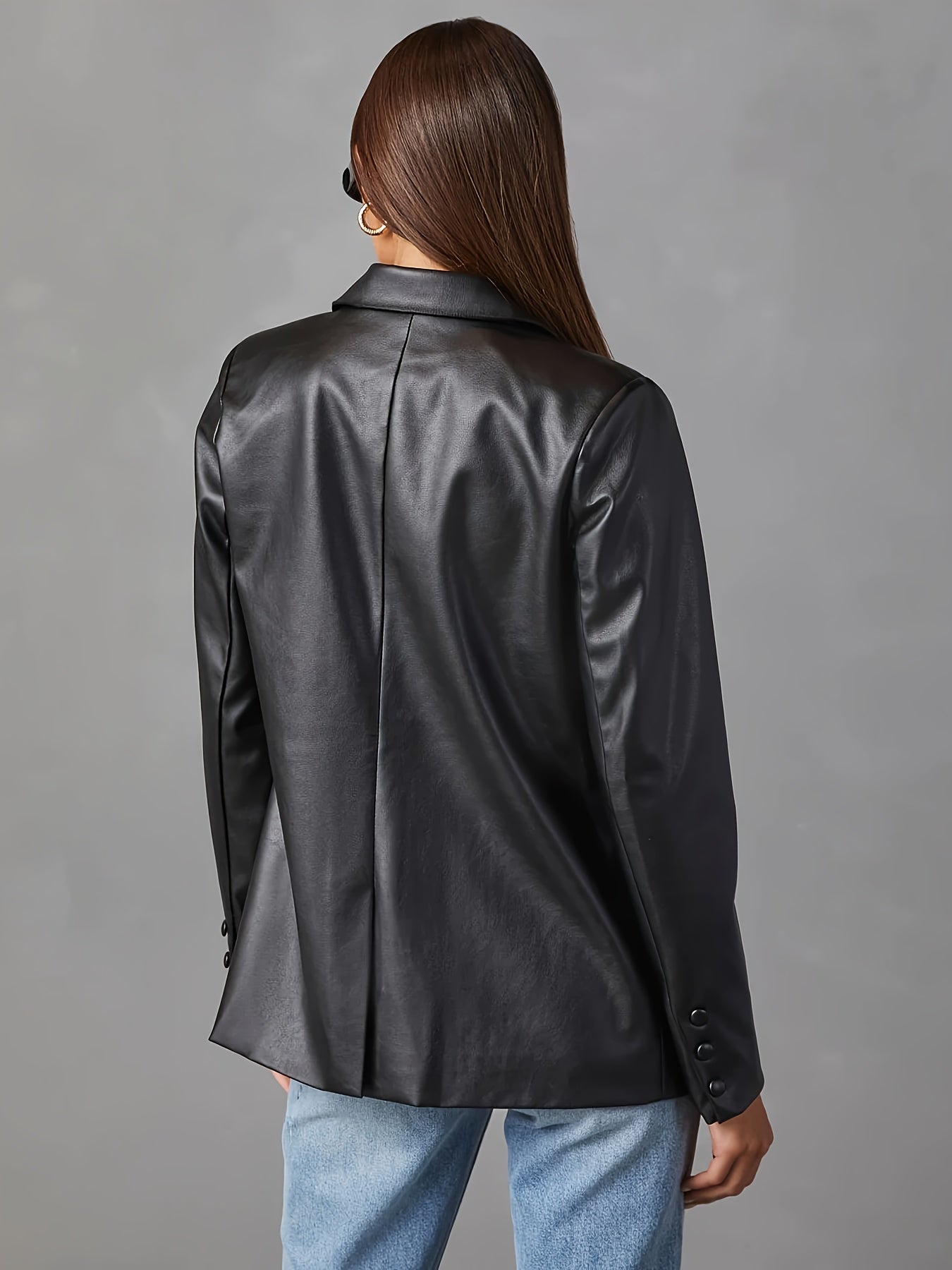 Veste en cuir noir avec bouton