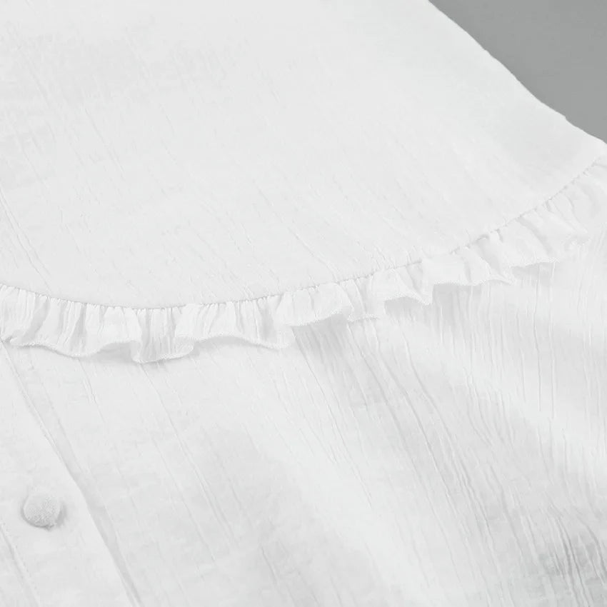 Robe d'été blanche à lacets