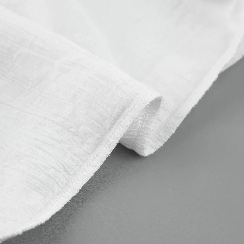 Robe d'été blanche à lacets