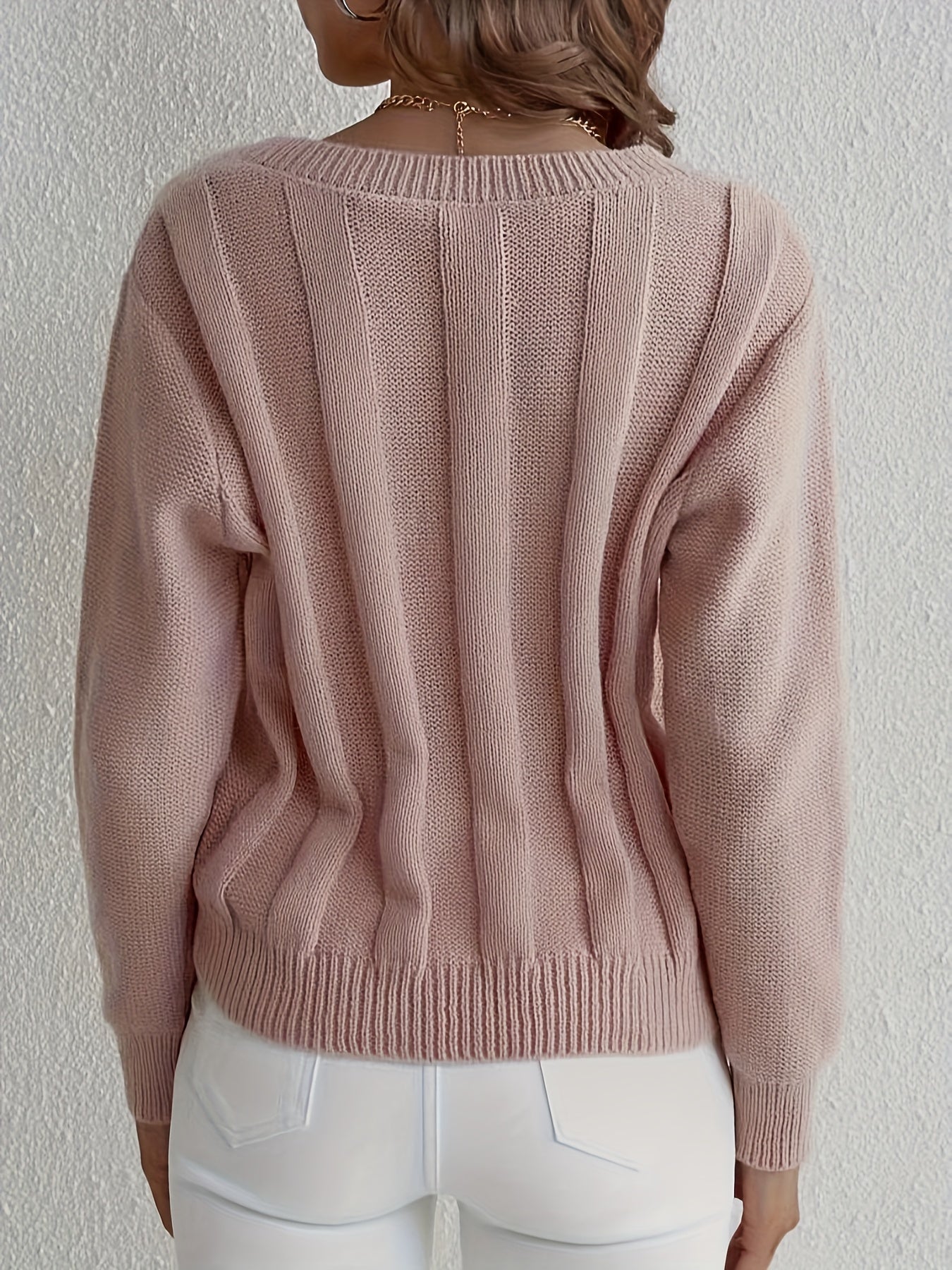 Pull tricoté avec col en V