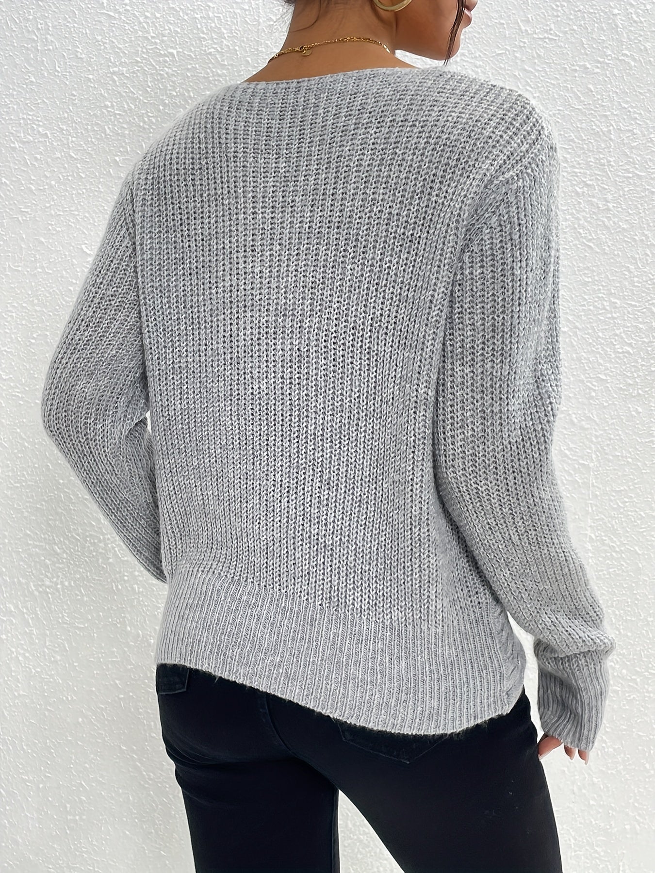 Pull col V avec devant torsadé pour femme